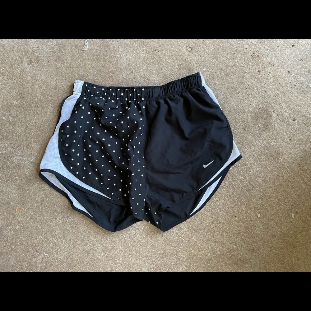 black Nike shorts with stars